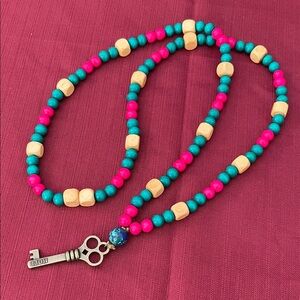 Hand assembled beaded necklace hope key